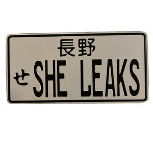 She Leaks Metal Novelty License Plate New